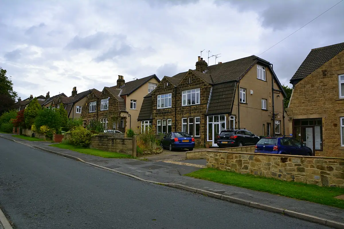 Stone semi-detached houses on Bentcliffe Drive in Roundhay, Leeds